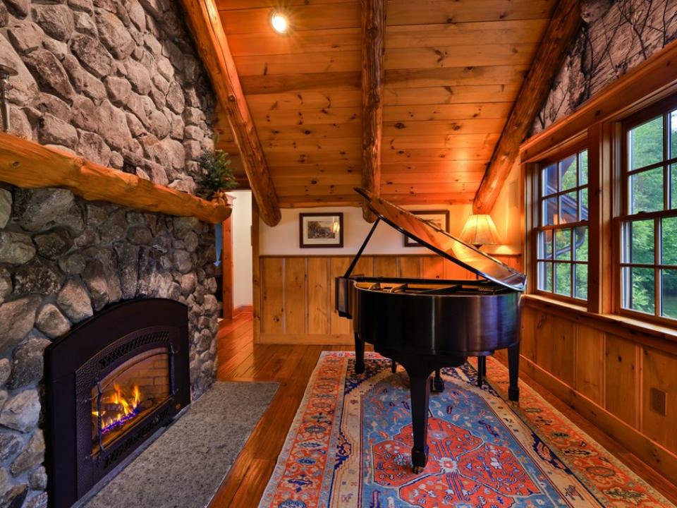 Den with Fireplace and Piano