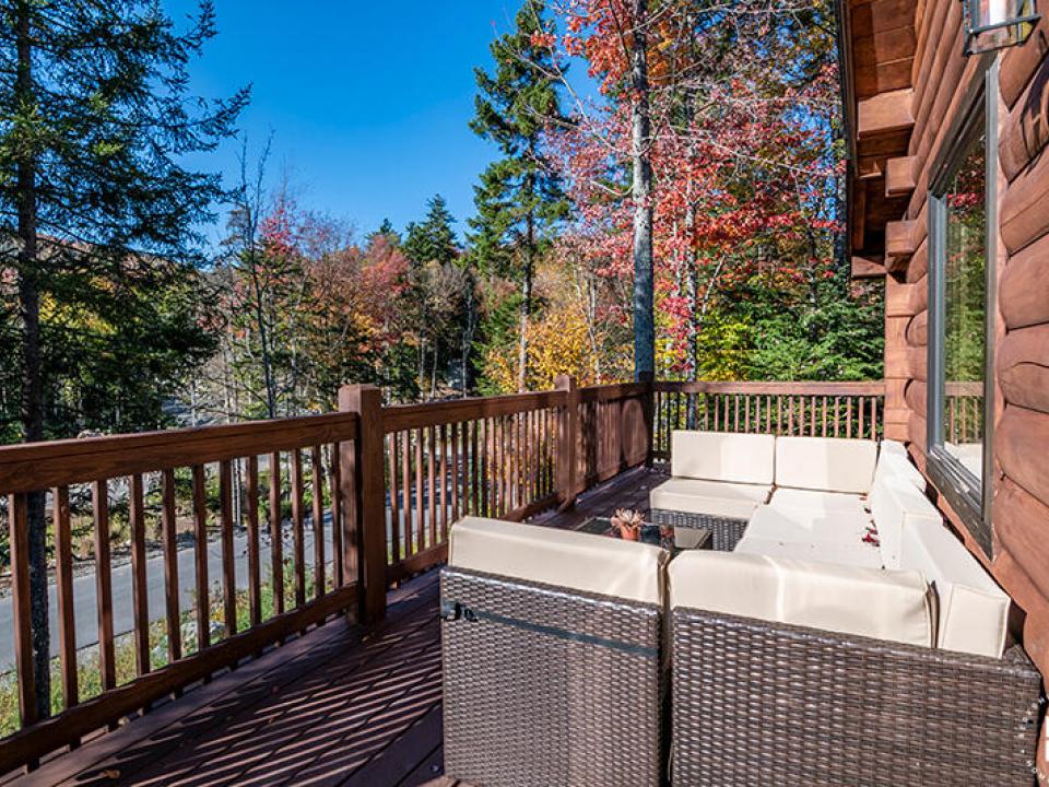 NewlyBuiltCottageInLakePlacid_Deck_Couch NewlyBuiltCottageInLakePlacid_Deck_Couch