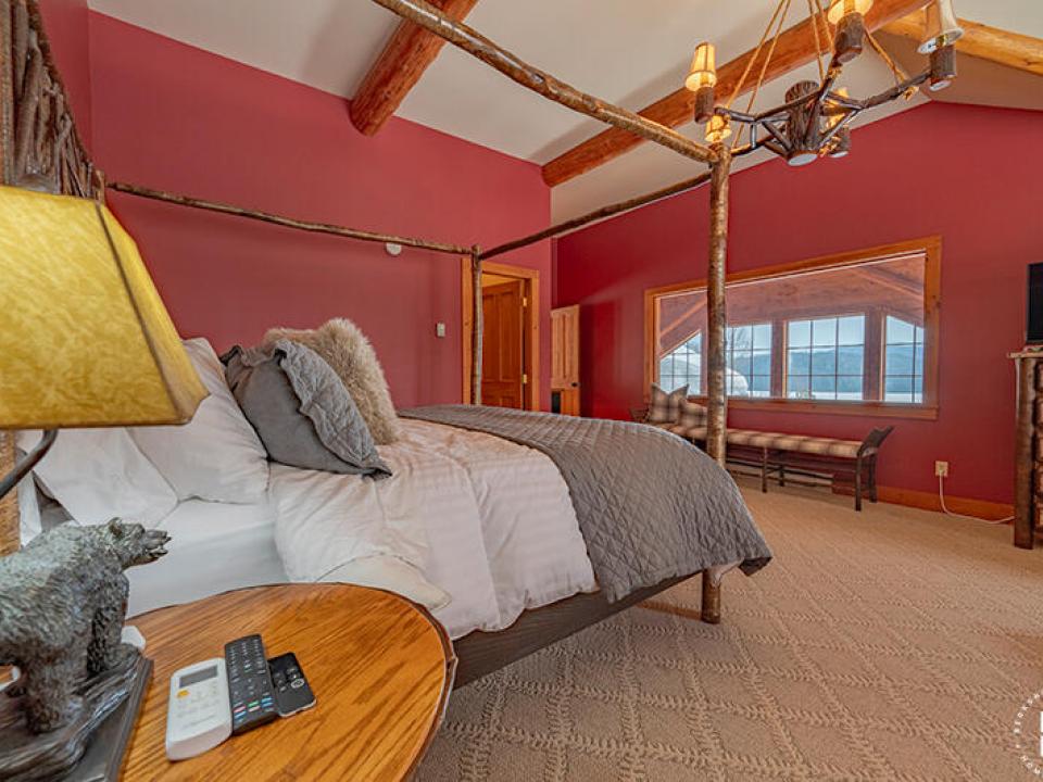 CustomBuiltADKHomeOnOverlook_Bedroom1_Fr