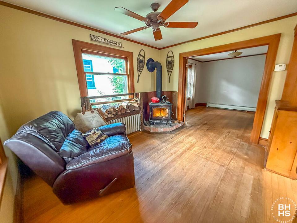 SLHomeOnOldLakeColby_Summer_LR_Fireplace