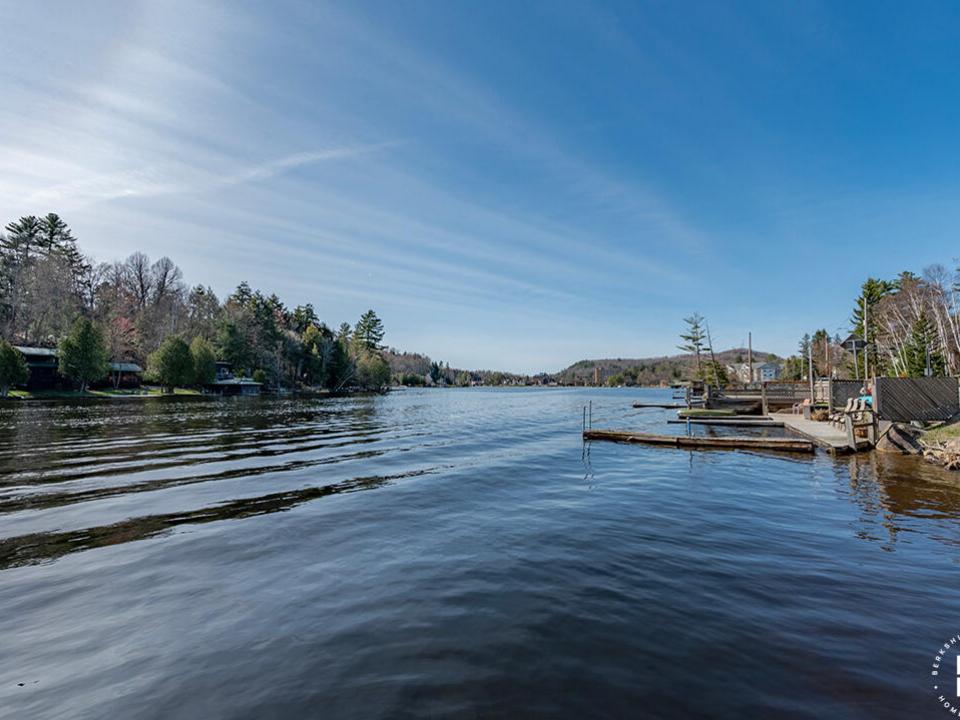 CozyHomeOnLakeFlower_Dock_View_R CozyHomeOnLakeFlower_Dock_View_R