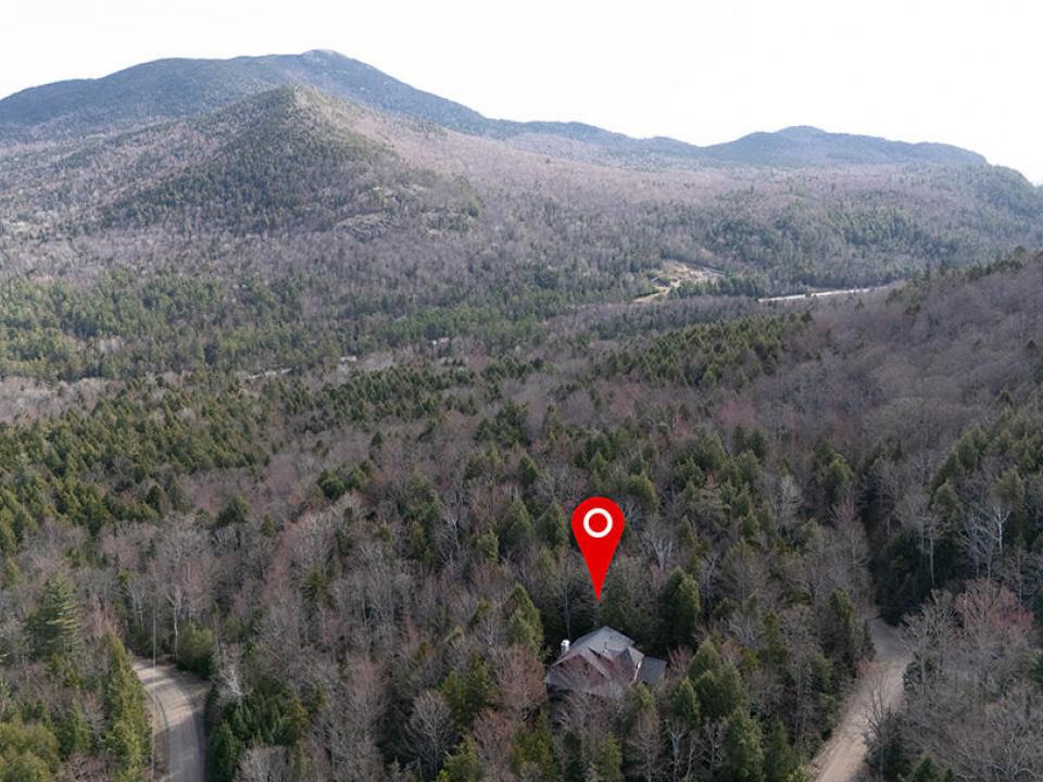 KeeneHomeOnRoundTop_A_Exterior_Side