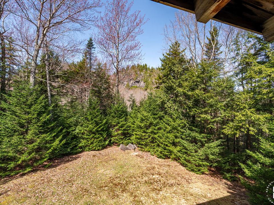 KeeneHomeOnRoundTop_CoveredPorch_View