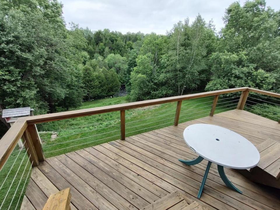 Deck on Home Overlooking the River Below