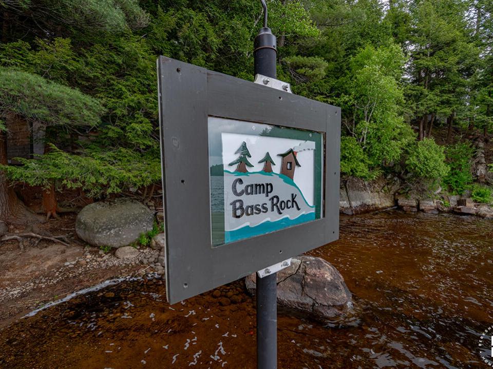 CampBassRockOnTupperLake_Dock_CampSign