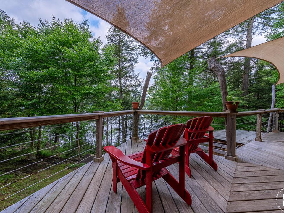 CampBassRockOnTupperLake_MH_MD_RedChairs