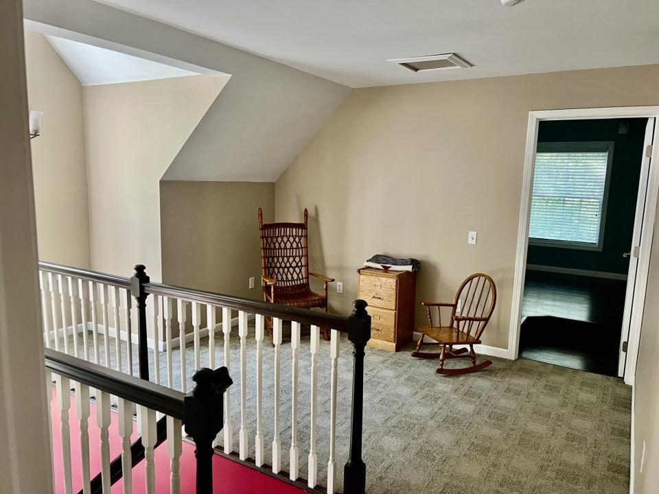 sitting area at top of stairs