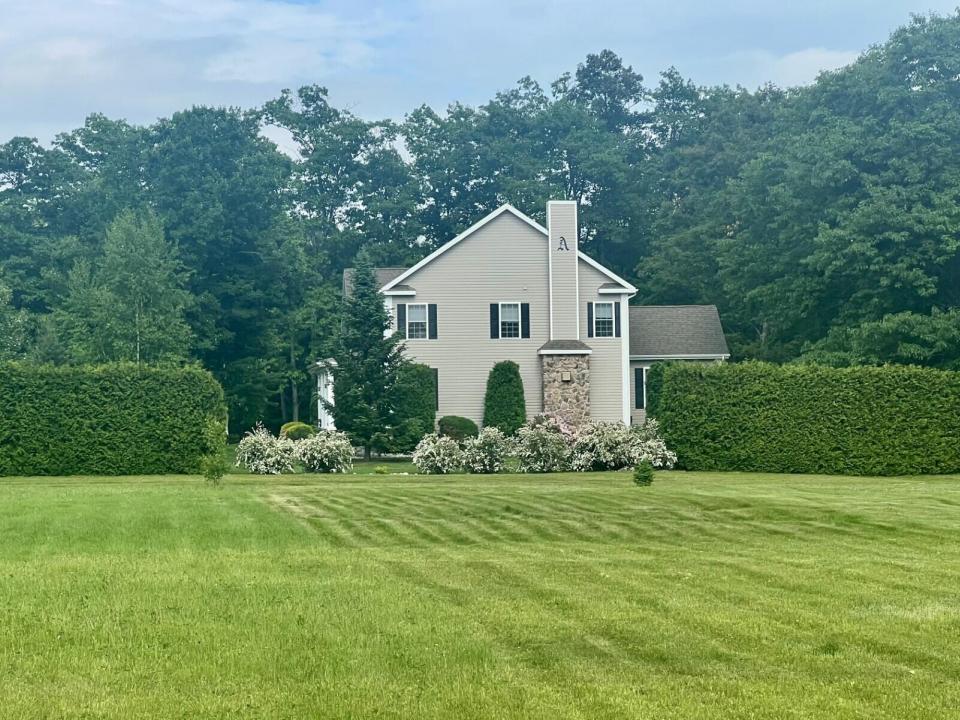 from road showing open expansive lot