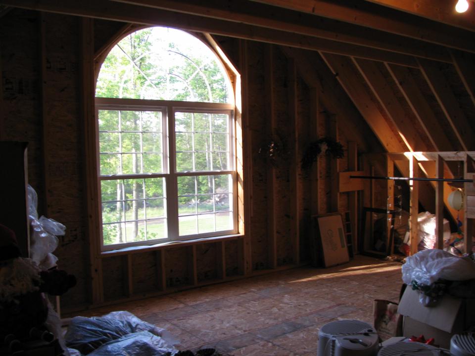 window in cold storage above garage