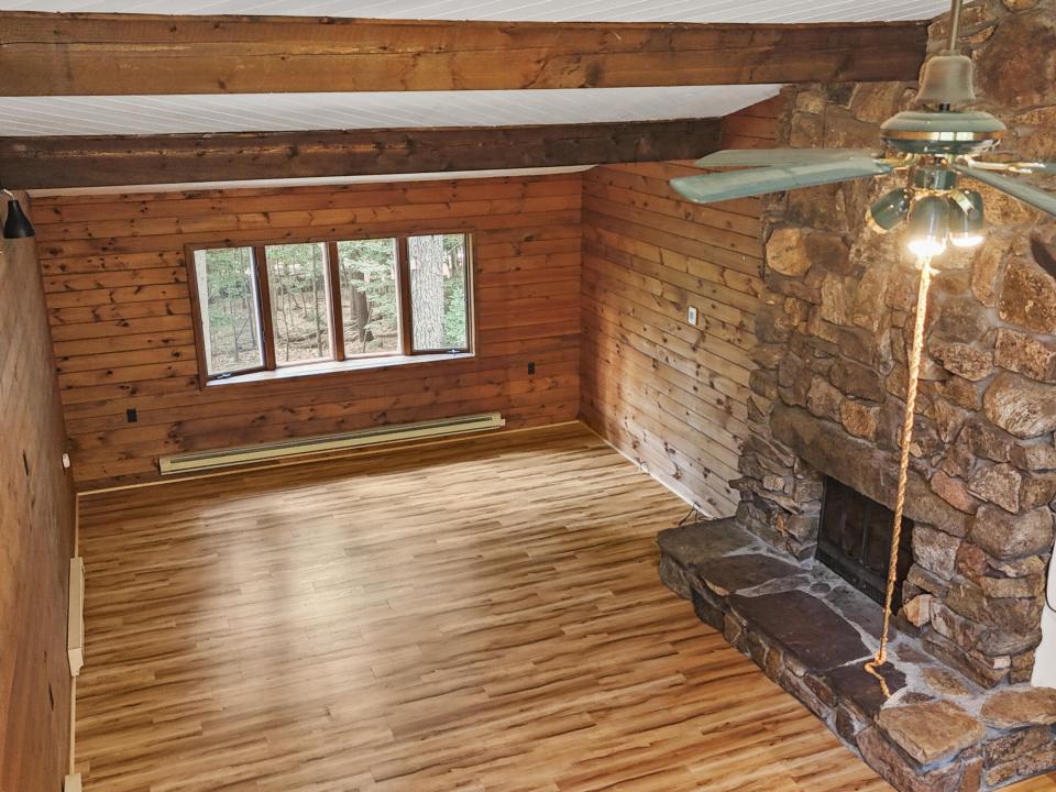 Living room has vaulted ceilings