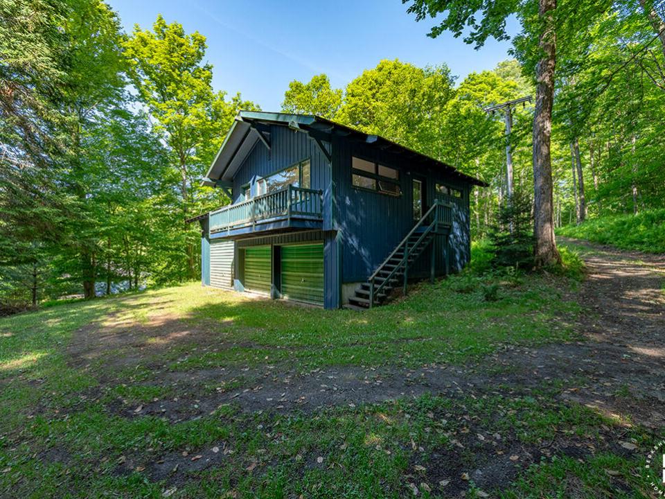 AdkCompoundOnUpperSaranac_Garage_Exterio