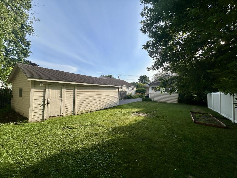 Back Yard & Detached 1 car Garage