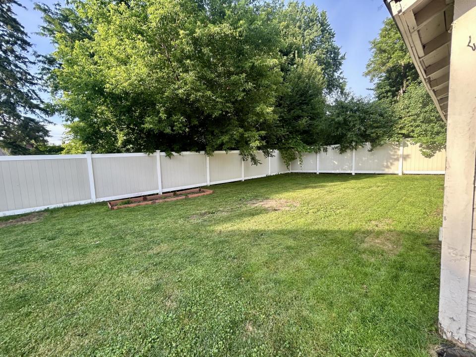 Back Yard & Detached 1 car Garage