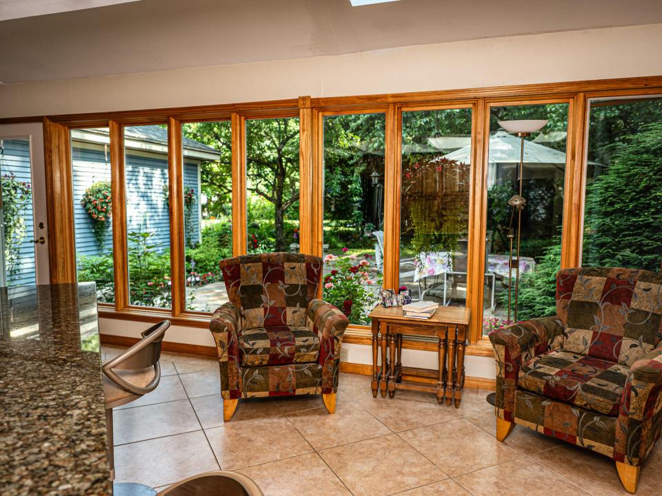 Windows to back patio and seating
