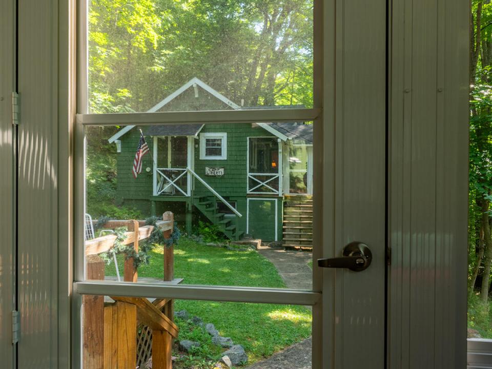 CharmingHomeOnMountainLane_ScreenedPorch