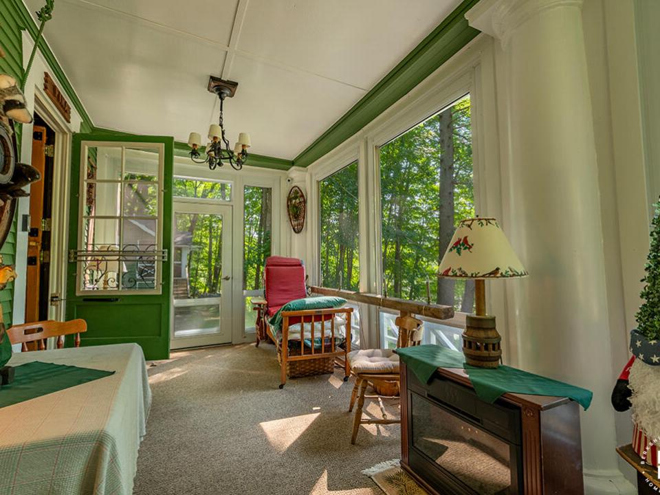 CharmingHomeOnMountainLane_ScreenedPorch