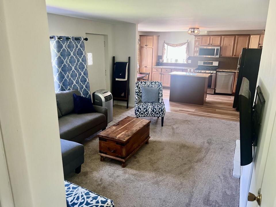 open concept LR into eat in kitchen