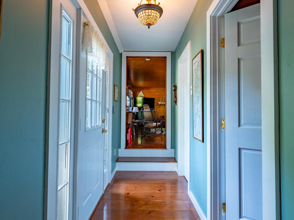 EssexHomeWithLakeViews_Hallway_To_GR