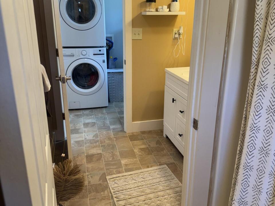 from bath into laundry area