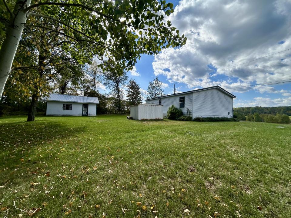 View of Back Yard & Side of House