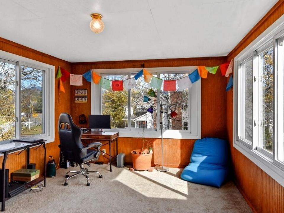 Den with large windows