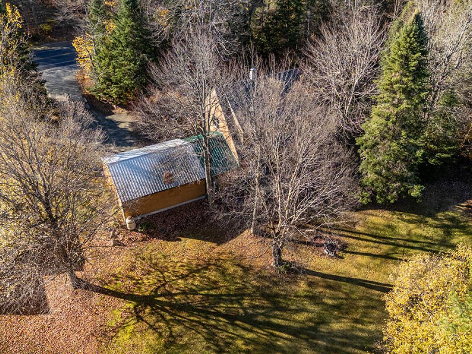 HomeInRainbowLake_A_Exterior_Back_Mid