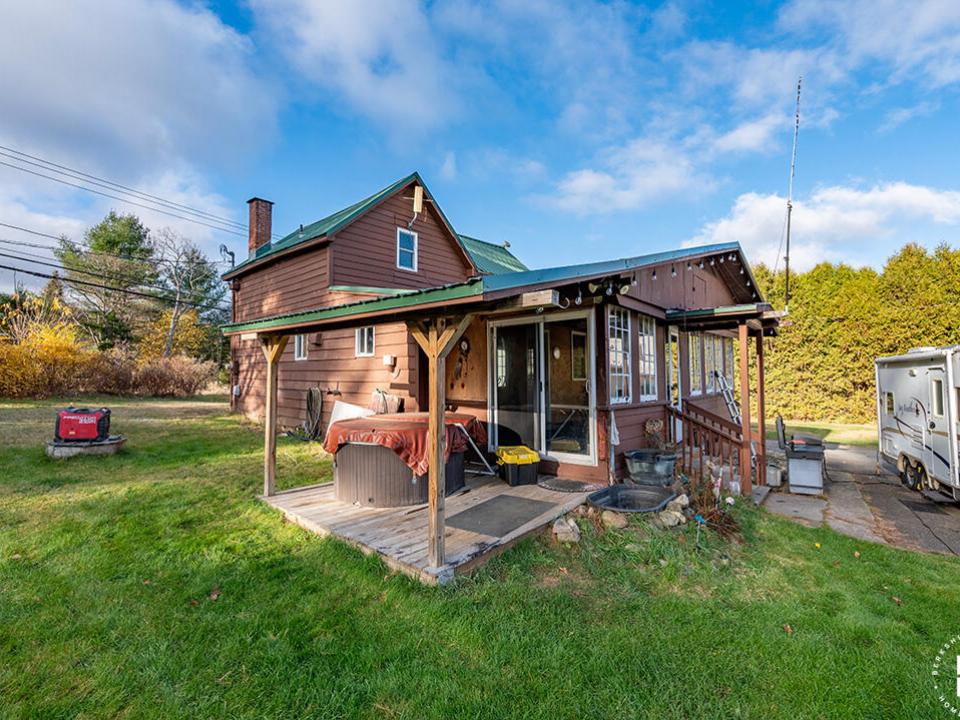 LakePlacidHomeOnOldMil_Exterior_HotTub
