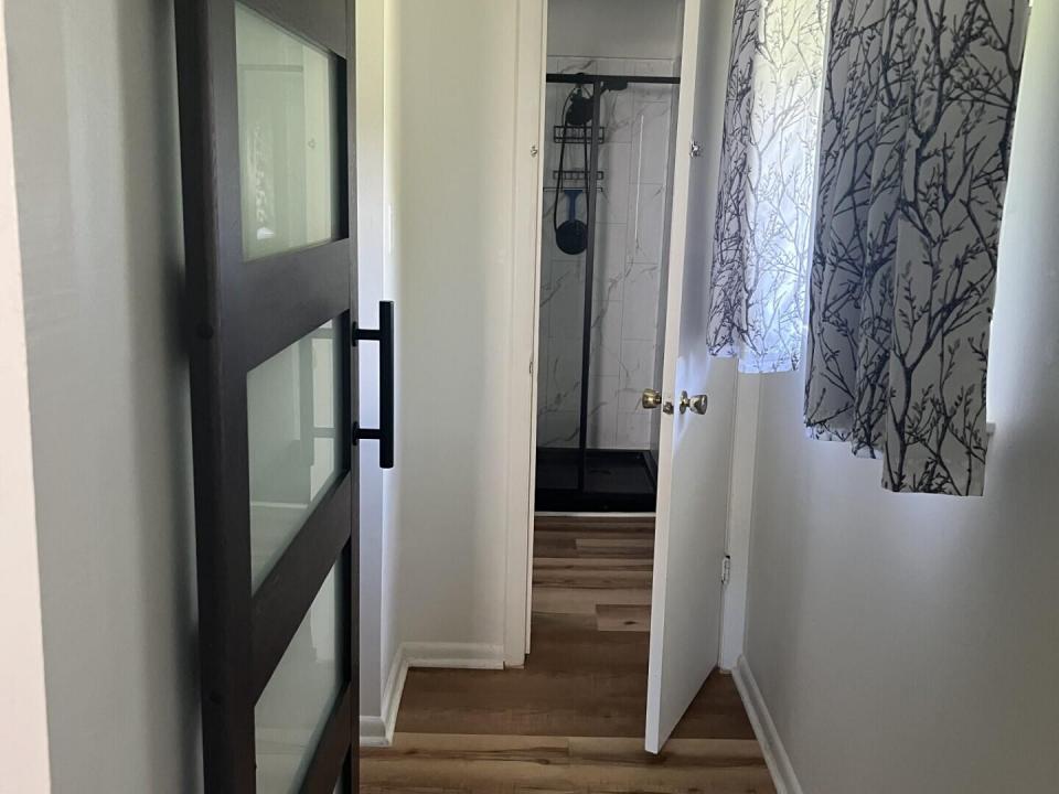 from br1 walk in closet to bath