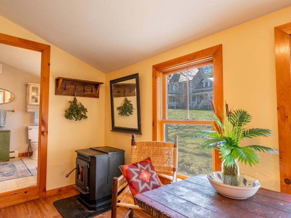 EssexHomeWithLakeViews_S_Entry_Chair_Woo