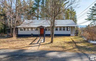 RenovatedHomeOnAveryville_Exterior_Mtns