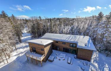 LakePlacidHomeOnLambs_A_Exterior_Back_WA